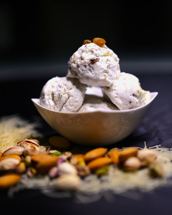 Scoops of ice cream with pistachios and almonds